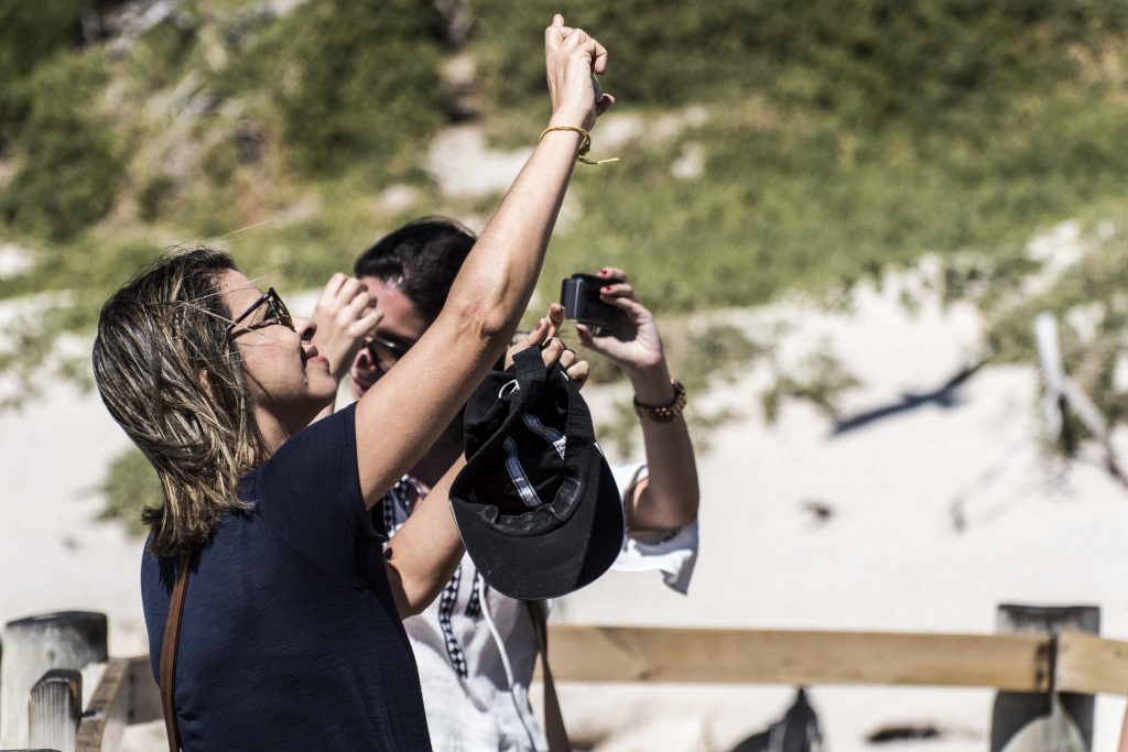 Woman taking selfie at Boulders Beach