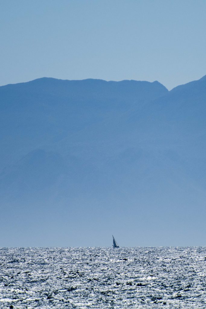 Yacht in the distance from Boulders Beach